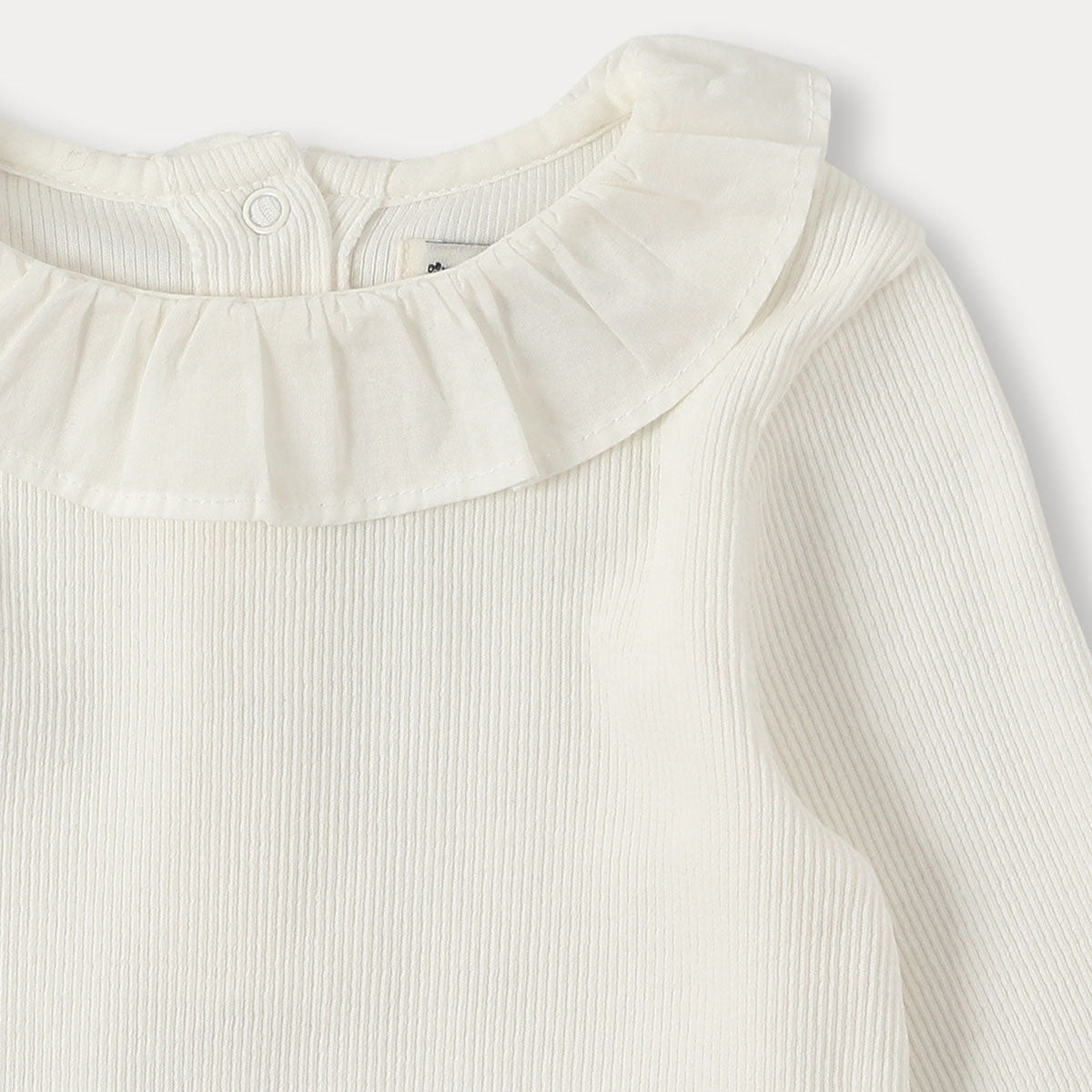 Ribbed Ruffle Top	| Ivory